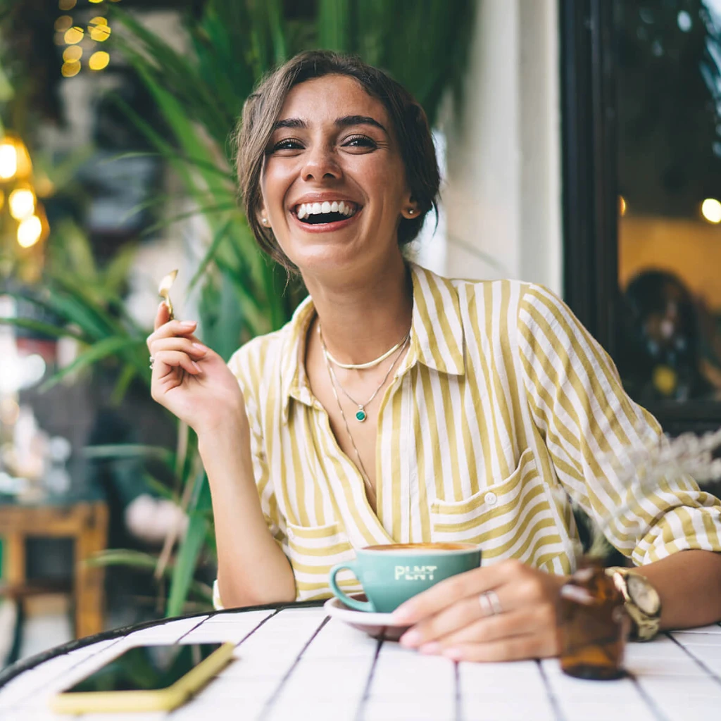 Lady with PLNT coffee LR.jpg